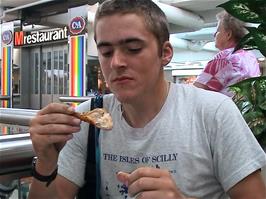Luke enjoys his chicken meal at a welcome restaurant in the Marin Centre, Epagnier, 37.1 miles into the ride.  There is a Migros Supermarket here as well